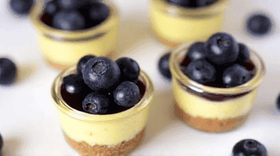 Mini Lemon Blueberry Cheesecakes Individual Jars with a Buttery Graham Cracker Crust