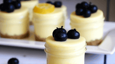 Mini Lemon Blueberry Cheesecakes Individual Jars with a Buttery Graham Cracker Crust