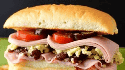 Muffuletta Sandwich New OrleansStyle with Olive Salad Cold Cuts  Provolone