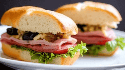 Muffuletta Sandwich New OrleansStyle with Olive Salad Cold Cuts  Provolone