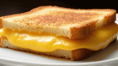 The Ultimate Grilled Cheese Sandwich 3 Cheese Blend Garlic Butter  Crispy Sourdough Perfection
