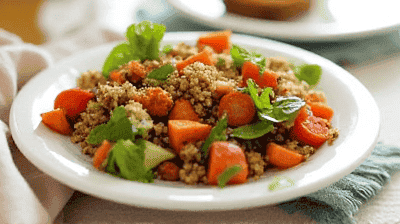 Warm Roasted Sweet Potato  Quinoa Salad with MapleTahini Dressing